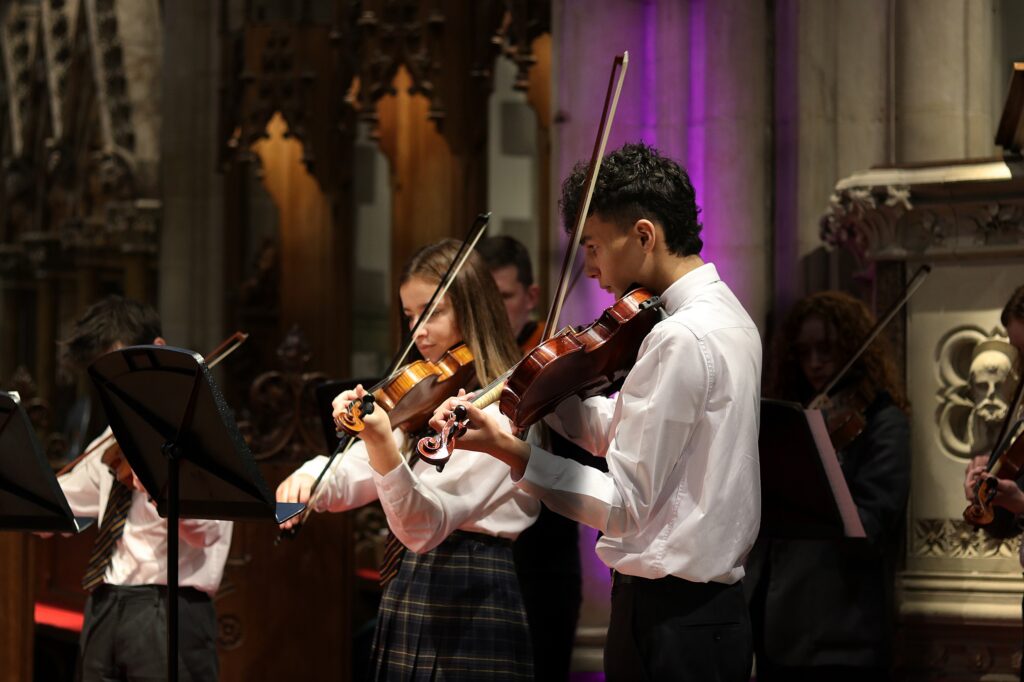 Senior Years strings players rehearsing at St Paul's Cathedral