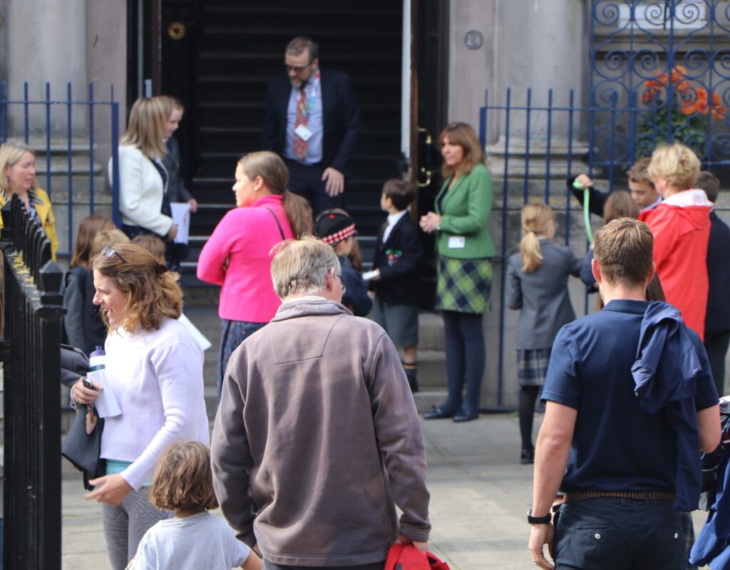 Open Morning visitors gathered and chatting to each other, staff and pupils during the event