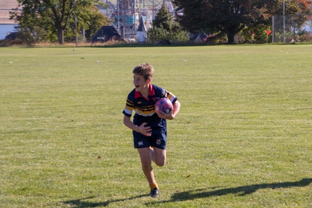 L7 pupil playing rugby at Mayfield